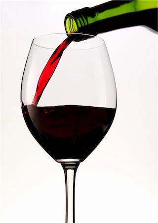 simsearch:659-06186663,k - Red wine being poured into a glass Stock Photo - Premium Royalty-Free, Code: 659-08895461
