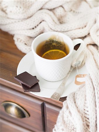 simsearch:659-06184015,k - A cup of hot tea with lemon, served with dark chocolate Stock Photo - Premium Royalty-Free, Code: 659-08895651