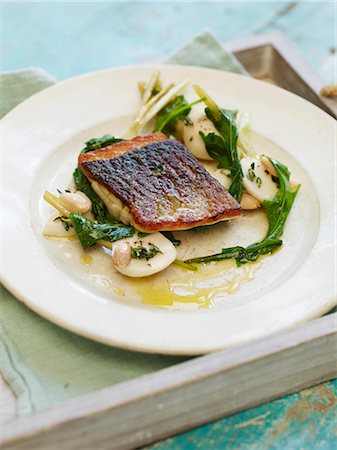 simsearch:659-06372915,k - Pan fried seabass, pickled summer turnips, wilted tops and toasted almonds Stock Photo - Premium Royalty-Free, Code: 659-08896009