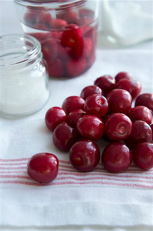 simsearch:659-07597339,k - Sour cherries being prepared for preservation Stock Photo - Premium Royalty-Free, Code: 659-08896953
