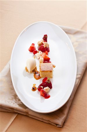 simsearch:659-07069181,k - A dessert plate with berries, vanilla ice cream and fresh cheesecake Stock Photo - Premium Royalty-Free, Code: 659-08897052