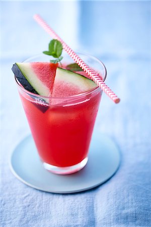 simsearch:659-06495307,k - A watermelon drink in a glass with a straw Stock Photo - Premium Royalty-Free, Code: 659-08905883