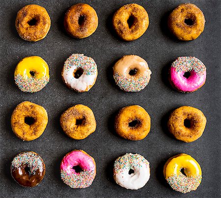 sprinkles - Assorted doughnuts in rows Stock Photo - Premium Royalty-Free, Code: 659-08906180