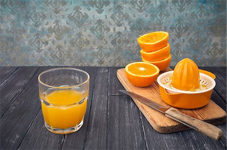 simsearch:659-06495307,k - Freshly pressed orange juice in a glass Stock Photo - Premium Royalty-Free, Code: 659-08906404