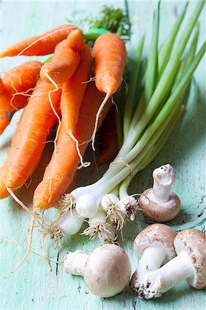 simsearch:400-06864386,k - Carrots, spring onions and fresh organic mushrooms Stock Photo - Premium Royalty-Free, Code: 659-08906435