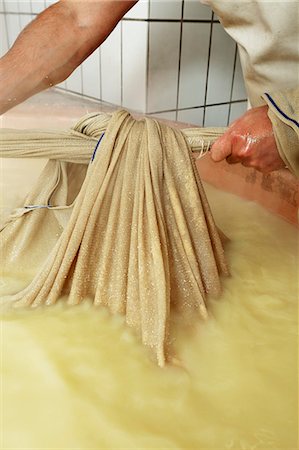 Mountain cheese being made in an alpine dairy in Tyrol Stock Photo - Premium Royalty-Free, Code: 659-08902886