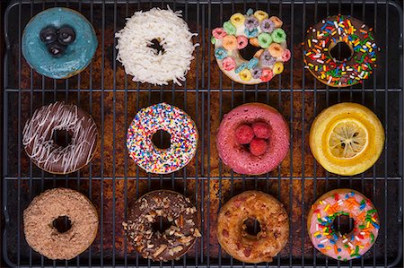 Various decorated doughnuts Stock Photo - Premium Royalty-Free, Code: 659-08939903