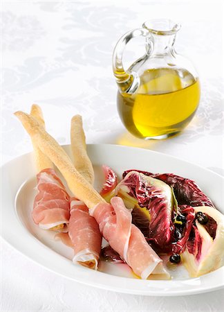 simsearch:659-06307822,k - Breadsticks with San Daniele ham and a radicchio salad Stock Photo - Premium Royalty-Free, Code: 659-08940576