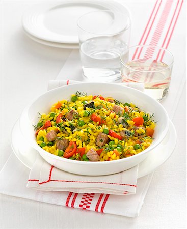 simsearch:659-08940768,k - Risotto with saffron, meat and vegetables Stock Photo - Premium Royalty-Free, Code: 659-08940580