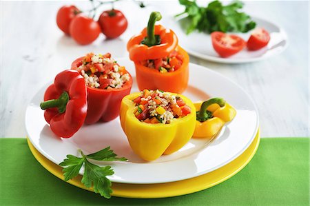simsearch:659-06373046,k - Red, yellow and orange peppers filled with a rice, pepper and tomato salad Stock Photo - Premium Royalty-Free, Code: 659-08940652