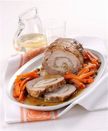 simsearch:659-08940768,k - Arrosto di maiale ai capperi (roast pork filled with capers, Italy) Stock Photo - Premium Royalty-Free, Code: 659-08940678