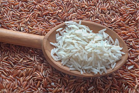 simsearch:659-06306291,k - A spoon of basmati rice on red rice (seen above) Stock Photo - Premium Royalty-Free, Code: 659-08940845