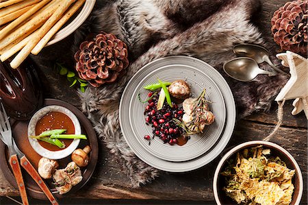 put on a table - Rosemary medallions on a winter themed table (seen from above) Stock Photo - Premium Royalty-Free, Code: 659-08940931