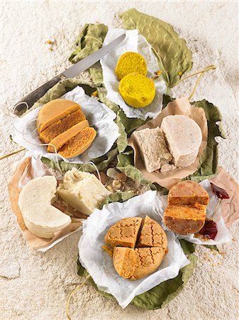 simsearch:659-06306291,k - Different types of vegan cheese seasoned with argan oil, curry powder and turmeric Stock Photo - Premium Royalty-Free, Code: 659-09124202