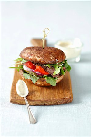 food (non beverage) - Portobello burger with grilled beef, red pepper and gherkins Stock Photo - Premium Royalty-Free, Code: 659-09124242