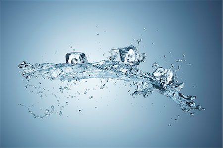 A splash of water with ice cubes Stock Photo - Premium Royalty-Free, Code: 659-09125000