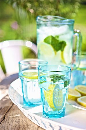 simsearch:659-06495307,k - Water with lemon and mint on a garden table Stock Photo - Premium Royalty-Free, Code: 659-09125750