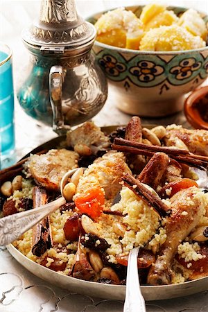 Couscous with chicken, dried fruit, almonds and cinnamon Stock Photo - Premium Royalty-Free, Code: 659-01844512