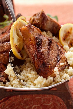 simsearch:659-06186142,k - Lamb cutlets with couscous and lemon Stock Photo - Premium Royalty-Free, Code: 659-01845405