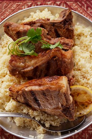 simsearch:659-06186142,k - Grilled lamb chops on couscous (N. Africa) Stock Photo - Premium Royalty-Free, Code: 659-01845409