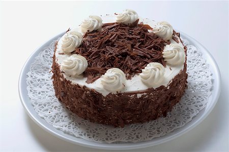 simsearch:659-01848790,k - Chocolate cream cake Stock Photo - Premium Royalty-Free, Code: 659-01846266