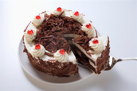 simsearch:659-01848790,k - Black Forest gateau, a piece cut, with piece on server Stock Photo - Premium Royalty-Free, Code: 659-01846287