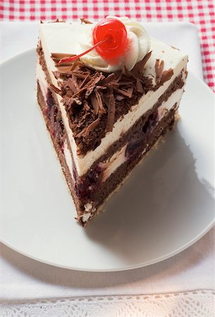 simsearch:659-01848790,k - Piece of Black Forest gateau with cherry Stock Photo - Premium Royalty-Free, Code: 659-01846288