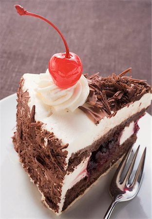 simsearch:659-01848790,k - Piece of Black Forest gateau with cherry Stock Photo - Premium Royalty-Free, Code: 659-01846281