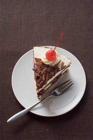 simsearch:659-01848790,k - Piece of Black Forest gateau with cherry Stock Photo - Premium Royalty-Free, Code: 659-01846282