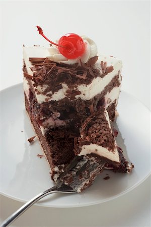 simsearch:659-01848790,k - Piece of Black Forest gateau with cherry Stock Photo - Premium Royalty-Free, Code: 659-01846293