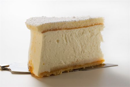 simsearch:659-01848790,k - Piece of cream cheesecake on cake slice Stock Photo - Premium Royalty-Free, Code: 659-01846376