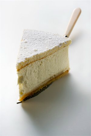 simsearch:659-01848790,k - Piece of cream cheesecake on cake slice Stock Photo - Premium Royalty-Free, Code: 659-01846377