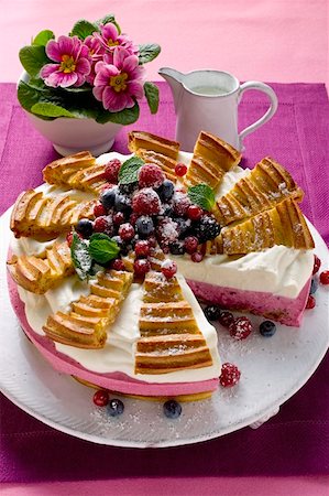 Redcurrant gateau, partly sliced Stock Photo - Premium Royalty-Free, Code: 659-01846719