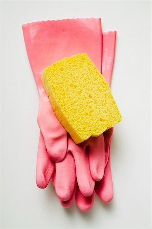 Pink rubber gloves and sponge Stock Photo - Premium Royalty-Free, Code: 659-01847213