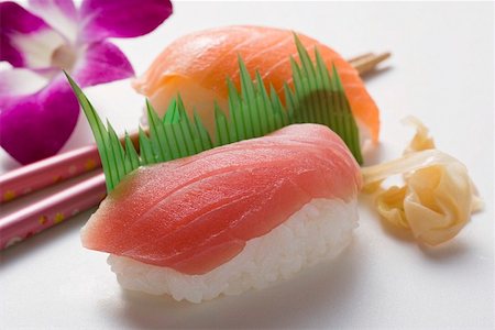 simsearch:659-07610354,k - Nigiri sushi with tuna and salmon and preserved ginger Stock Photo - Premium Royalty-Free, Code: 659-01849606