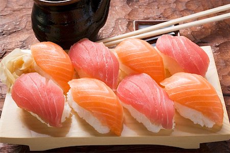 simsearch:659-07610354,k - Nigiri sushi and preserved ginger on sushi board Stock Photo - Premium Royalty-Free, Code: 659-01849624