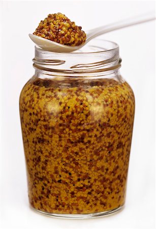 A Jar of Dijon Mustard with Spoonful Foto de stock - Sin royalties Premium, Código: 659-01842508