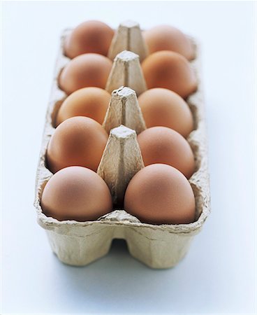 egg box - Ten brown eggs in egg box Stock Photo - Premium Royalty-Free, Code: 659-01842558