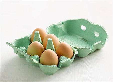 egg box - Five eggs in an egg box Stock Photo - Premium Royalty-Free, Code: 659-01843003