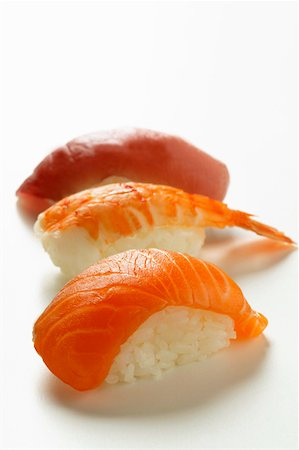 simsearch:659-07610354,k - Nigiri sushi with salmon, shrimp and tuna Stock Photo - Premium Royalty-Free, Code: 659-01843218