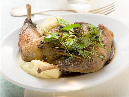 simsearch:659-01857024,k - Roast goose legs with mashed potato and herbs Stock Photo - Premium Royalty-Free, Code: 659-01857049