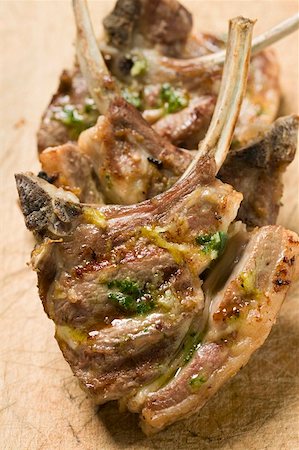 simsearch:659-06186142,k - Grilled lamb cutlets with herb oil Stock Photo - Premium Royalty-Free, Code: 659-01857275
