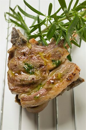 simsearch:659-06186142,k - Grilled lamb cutlets with herb oil and rosemary Stock Photo - Premium Royalty-Free, Code: 659-01857272