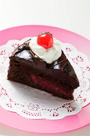 simsearch:659-01848790,k - Slice of chocolate cake with cream and cherry on doily Stock Photo - Premium Royalty-Free, Code: 659-01857956