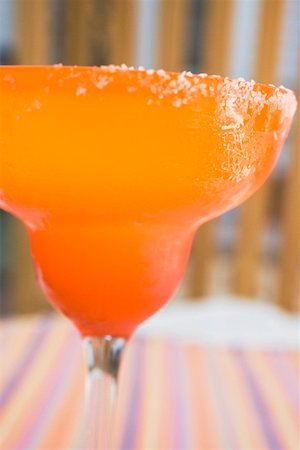 Margarita in orange glass with salted rim Stock Photo - Premium Royalty-Free, Code: 659-01858654