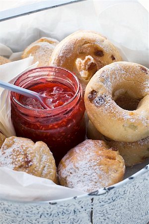 Raisin buns and jar of berry jam Stock Photo - Premium Royalty-Free, Code: 659-01859275