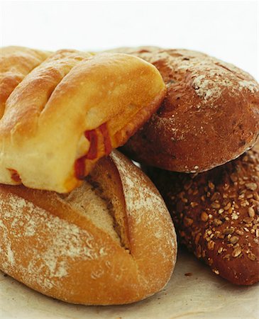 Rye bread, wholemeal bread, tomato bread & sourdough bread Stock Photo - Premium Royalty-Free, Code: 659-01850261