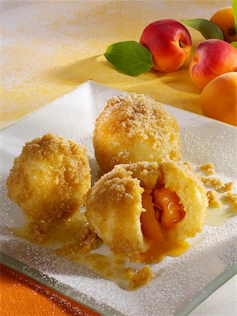 simsearch:659-01850806,k - Apricot dumplings with buttered breadcrumbs Stock Photo - Premium Royalty-Free, Code: 659-01851814