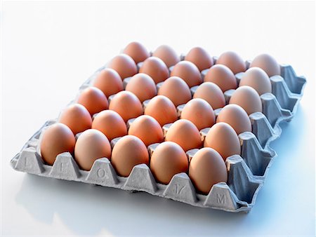 egg box - Brown eggs in an egg tray Stock Photo - Premium Royalty-Free, Code: 659-01852063