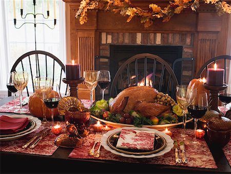 Stuffed turkey on Thanksgiving table (USA) Stock Photo - Premium Royalty-Free, Code: 659-01864741